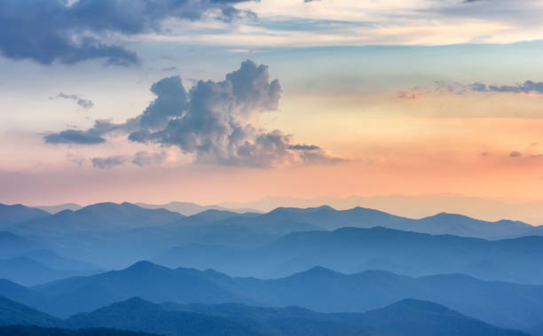 Dramatic Sunset along Blue Ridge Parkway with View of Smoky Mountains Colorful sky and view of mountain range in North Carolina. blue ridge mountains photos stock pictures, royalty-free photos & images