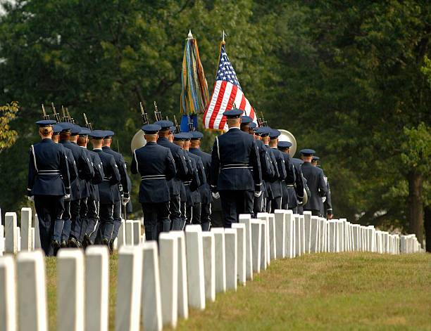 Rear view of military formation at Arlington funeral a formal military funeral at Arling National Cemetery arlington national cemetery funeral stock pictures, royalty-free photos & images