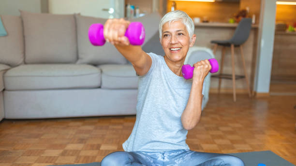 istock Nice elderly woman taking pleasure in the workout 1159868916