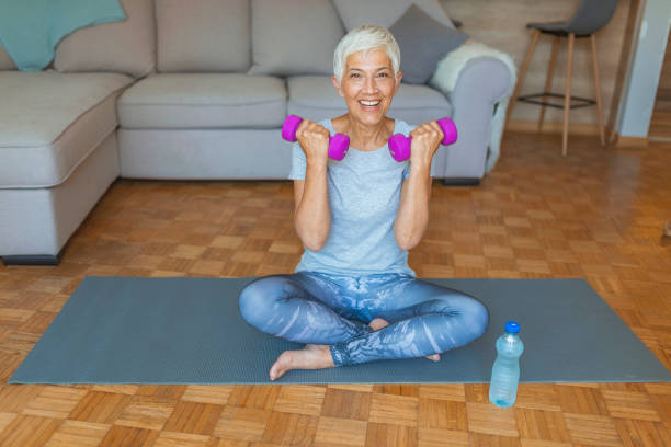 istock Mature Woman Exercise At Home 1159869053