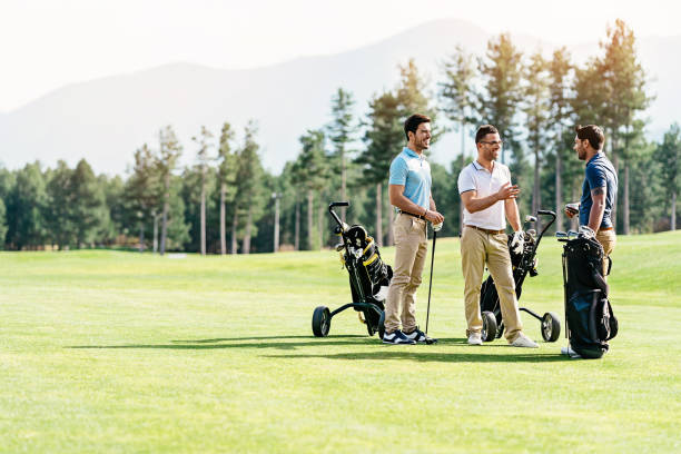 istock Group of golf players 1159871700