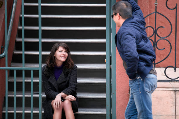 istock Neighbors Flirting at an Apartment Complex or Condo 1159875239