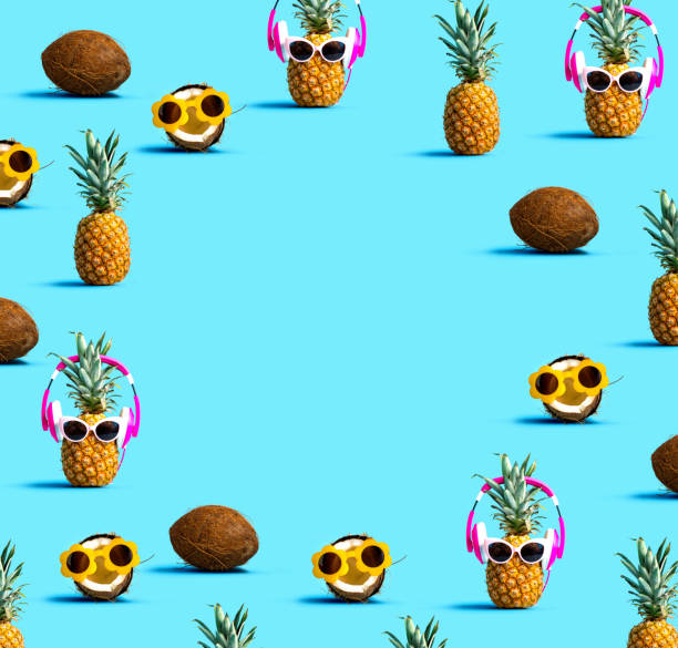 istock Pineapple and coconut wearing sunglasses 1159875799