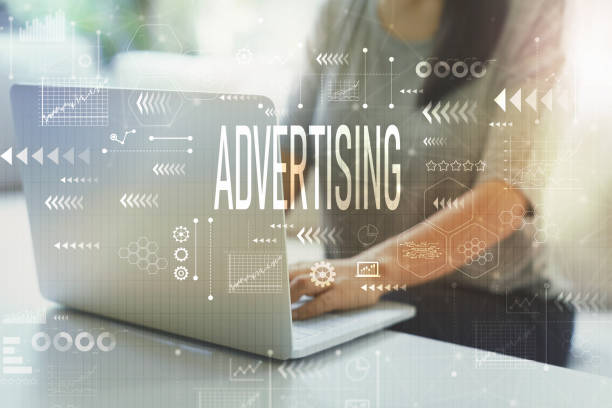 istock Advertising with woman using laptop 1159875811