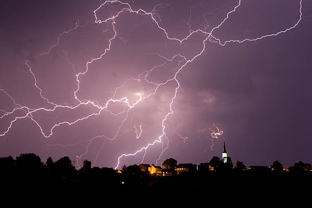 Storm and lightning over a little village. 