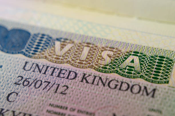 istock UK Multiple Entry Visa (Type C) sticker in the passport. 1159877978