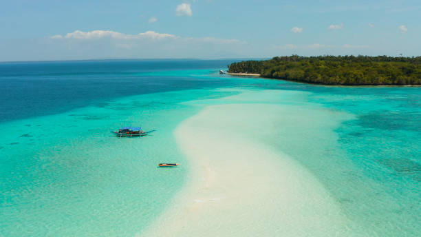 istock Sandy beach in the lagoon with turquoise water. Balabac, Palawan, Philippines 1159878371