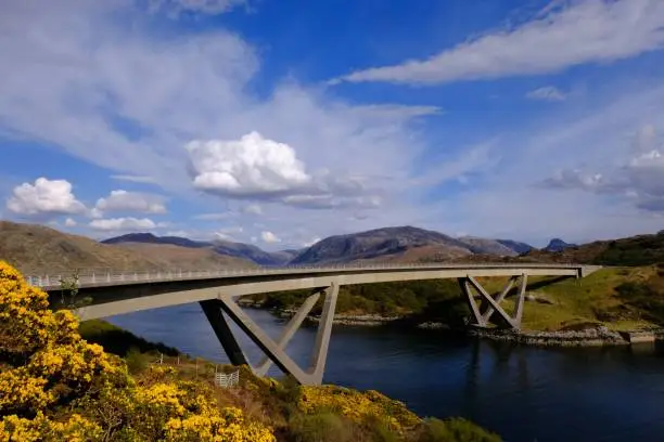The Kylesku Bridge on the North Coast 500 crossing the narrows on Loch Glendhu