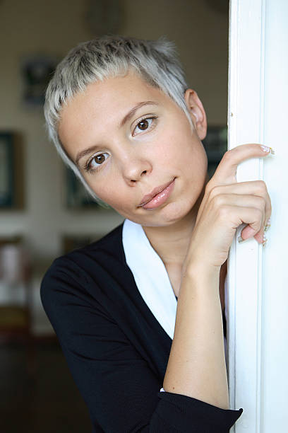 Young short haired woman stock photo