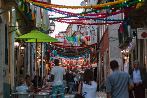 typical portuguese street with popular saints decoration - santos populares imagens e fotografias de stock