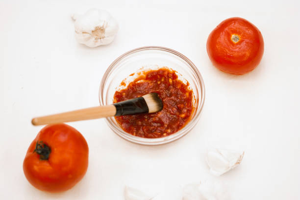 istock Tomato and garlic face mask 1159882120