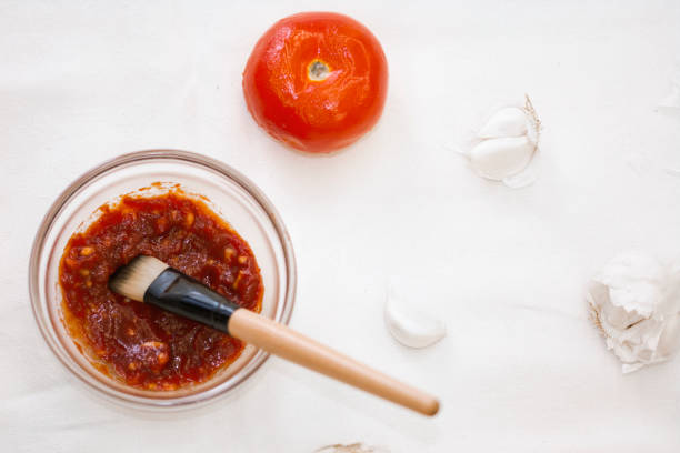 istock Tomato and garlic face mask 1159882137