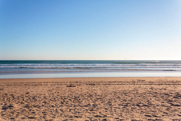 istock Beach background. Sand, sea and bue sky 1159883882