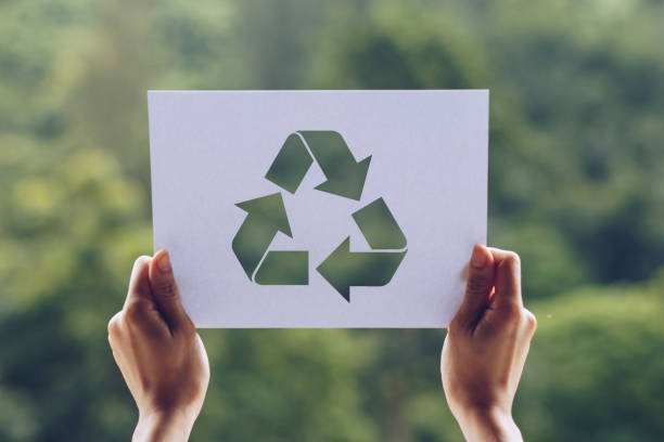 istock save world ecology concept environmental conservation with hands holding cut out paper recycle showing 1159884524
