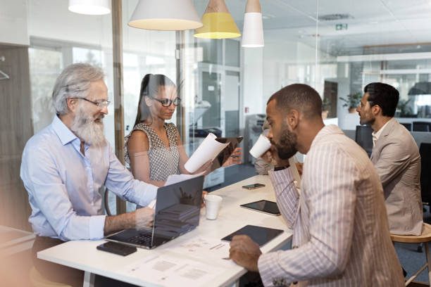 istock Creative business people on a meeting 1159884563