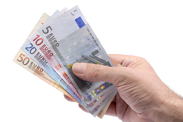 istock Euro notes or bills in male hand 115989178