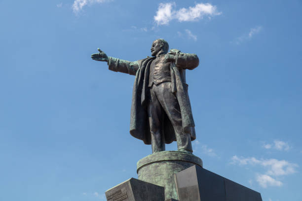 istock Lenin monument close up against the blue sky on a sunny summer day 1159902107