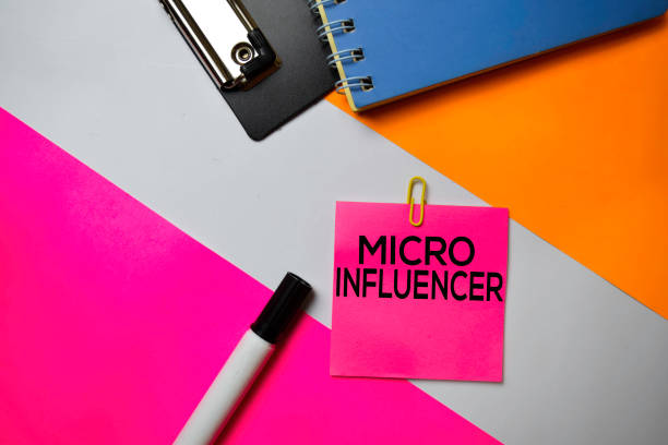 istock Micro Influencer text on sticky notes with color office desk concept 1159903429