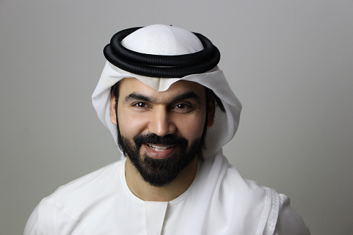 Arab Man Facing The Camera And Smiling Confidently