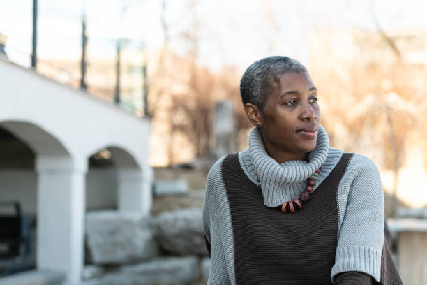 istock Contemplative elderly woman 1159909442