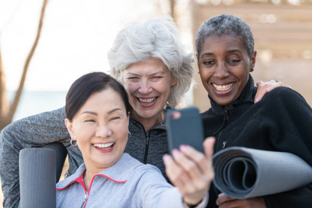 istock Elderly Friends Posing After Yoga 1159909460