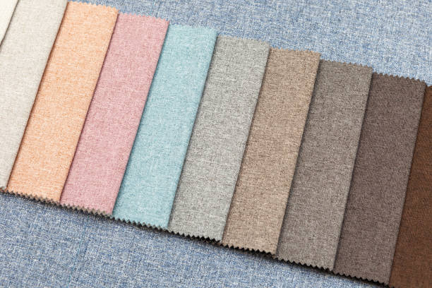 istock Multi-colored samples of upholstery fabric for sofas and chairs close-up. 1159911432