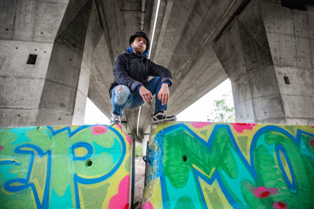 istock Proud Young Graffiti Artist and his Finished Work 1159912394