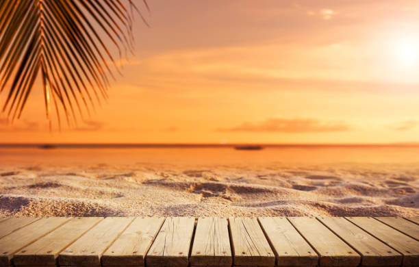 Wooden walkway on the sunset beach