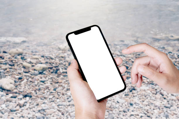 istock woman using Smartphone. Blank screen mobile phone for graphic display montage.networking service. 1159921923