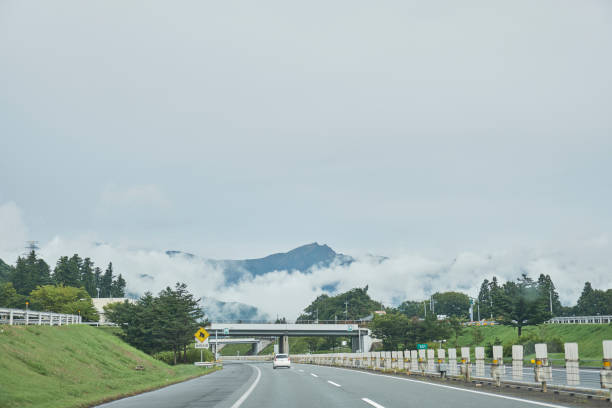 istock View from inside car of highway 1159924248