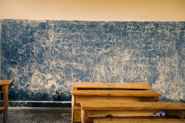 istock Classroom with tables and blackboard, Rwanda 1159933356