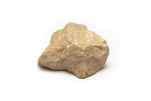 light yellow-brown stone on a white background