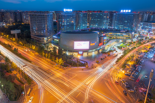 Chengdu, Sichuan province, China -June 5, 2019 : PangRuiLi commercial mall and crossroad with city skyline aerial view at night