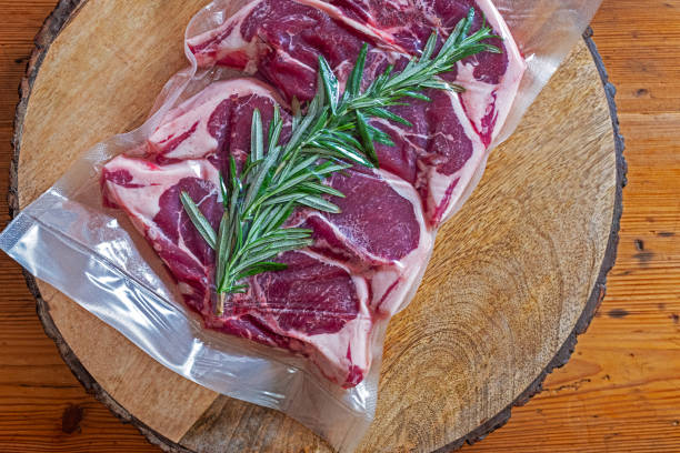 Lamb chops vacuumed  for preservation or sous vide cooking stock photo