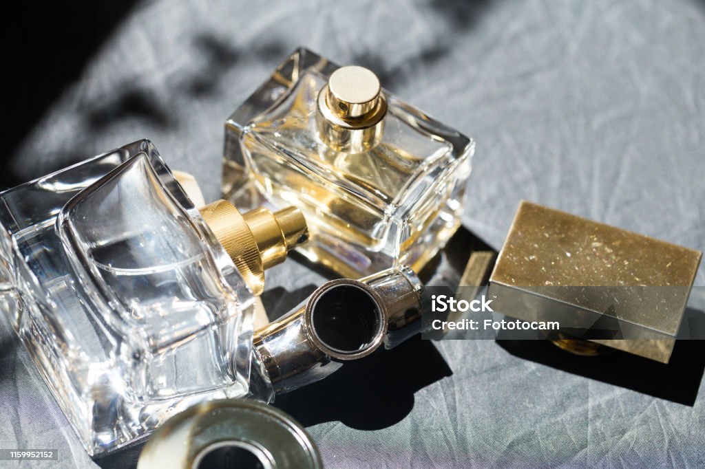 perfume bottle in the sun - Image. Perfume Stock Photo
