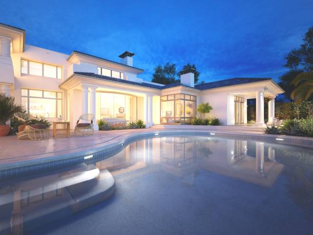 istock 3d render. Private villa pool view over night , exterior. 1159955318