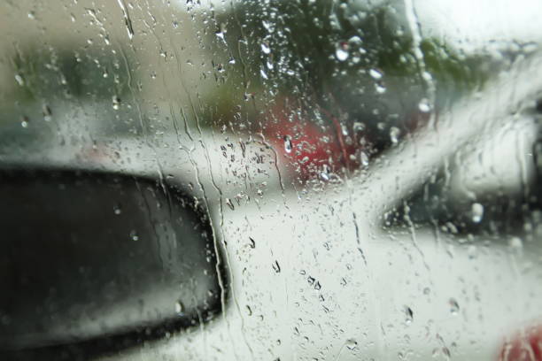istock Rain Drops on Car´s Window on Parking 1159955817