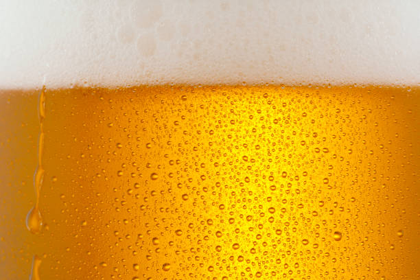 istock Beer Background. Ice Cold Beer Glass With Water Drops Condensation 1159956487