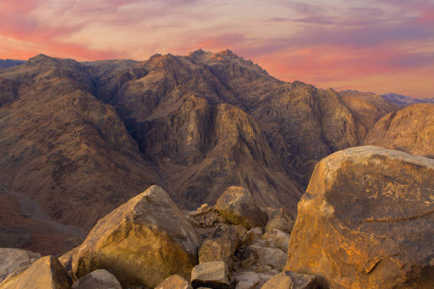 istock Beautiful view from the mountain. Panorama. Mountain range with visible silhouettes through the morning blue fog 1159956904