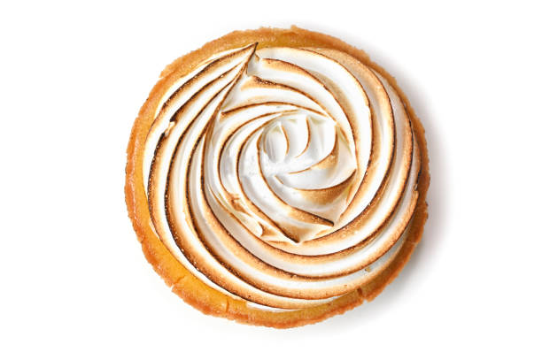 istock Lemon meringue tart on white background 1159960240