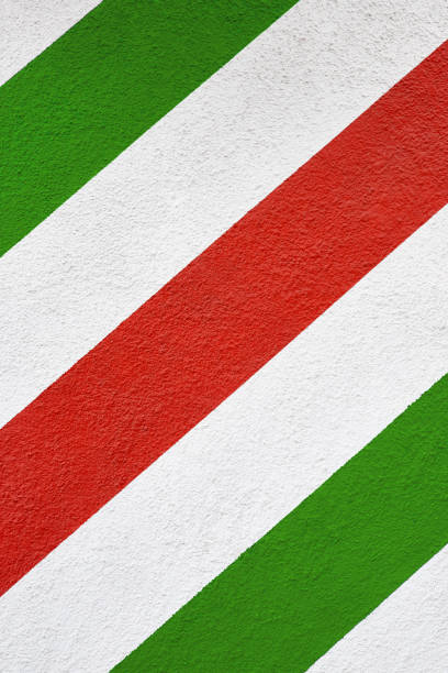 istock three colour diagonal painted plaster wall Italy flag colors 1159961172