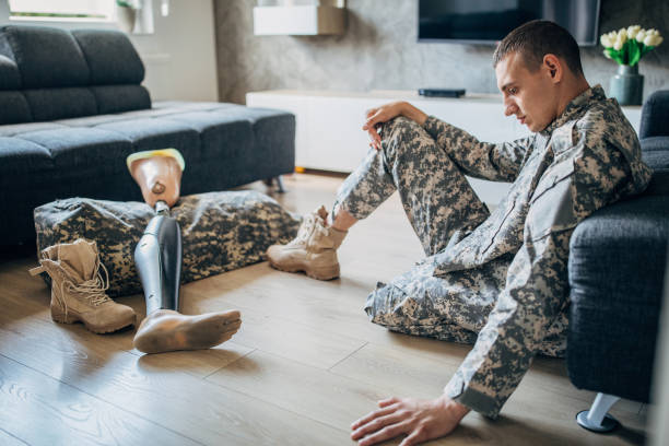 istock Disabled veteran US soldier at home 1159962645