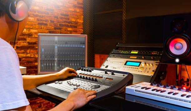 istock asian sound engineer mixing music in home recording studio 1159962662