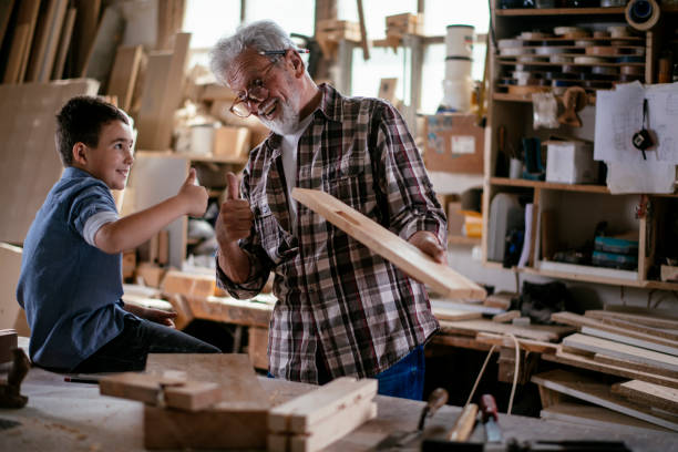 istock Grandfather teaching his grandson 1159968169