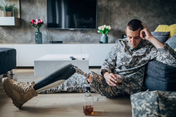 istock Disabled veteran US soldier drinking whiskey 1159968425