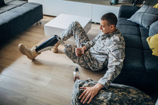 istock Disabled veteran US soldier marine drinking whiskey 1159969213