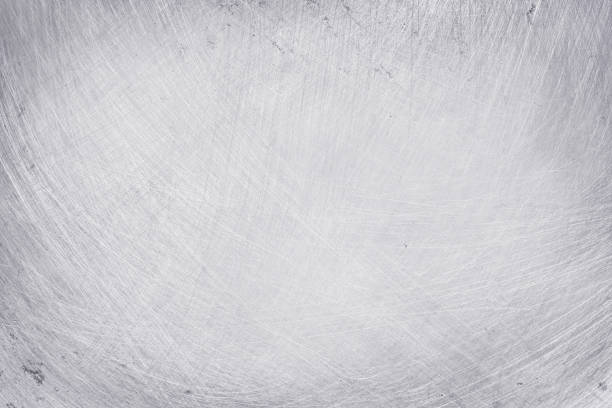 istock aluminium texture background, scratches on stainless steel. 1159969922