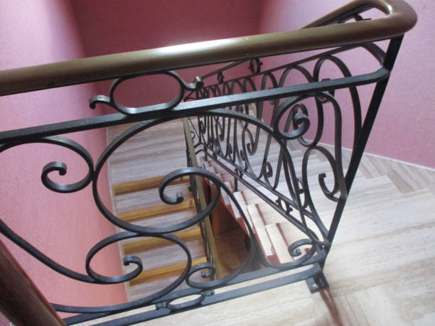 istock Staircase with wrought iron railing  Entrance hall 1159969940