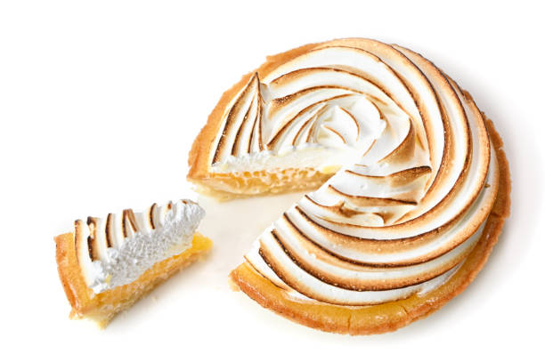 istock Lemon meringue tart on white background 1159974302