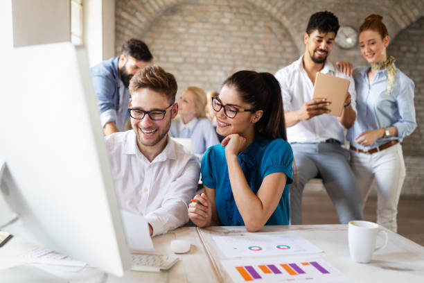 istock Successful business group of people at work in office 1159975084